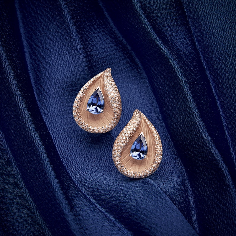 Prestige earrings on blue