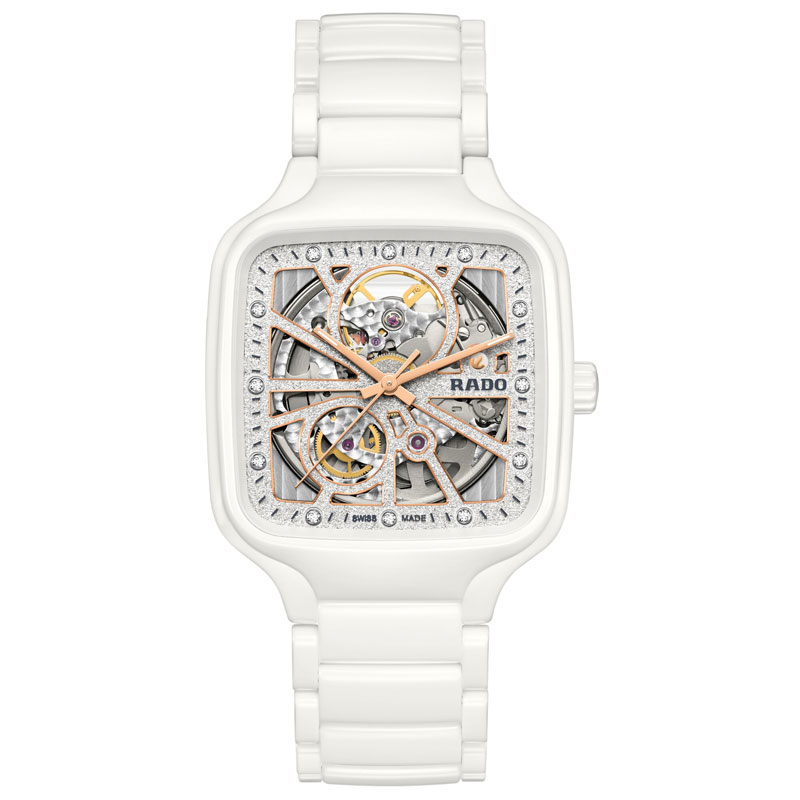 Weisse Rado Uhr mit skelettiertem Zifferblatt und rosegoldenen Zeigern